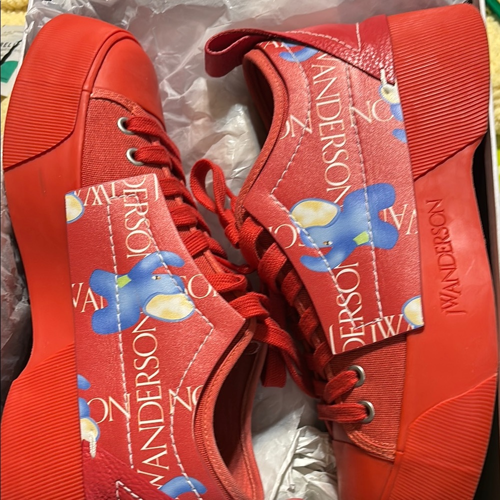 JW Anderson Vibrant Red Sneakers with Blue and Yellow Details